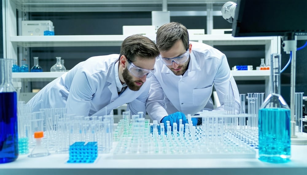 Engineers analyzing advanced materials in a laboratory setting